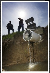 Some of the water that runs from Terry McClure’s Paulding County farm is captured for tests. ERIC ALBRECHT | DISPATCH PHOTOS Image 2 of 3